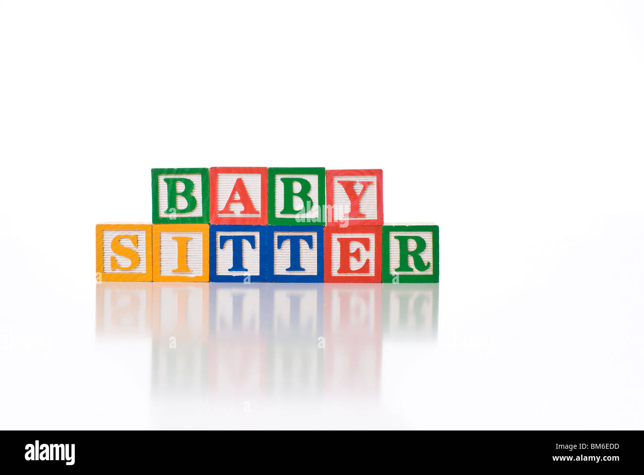Colorata per bambini ortografia blocchi le parole BABY SITTER Foto Stock