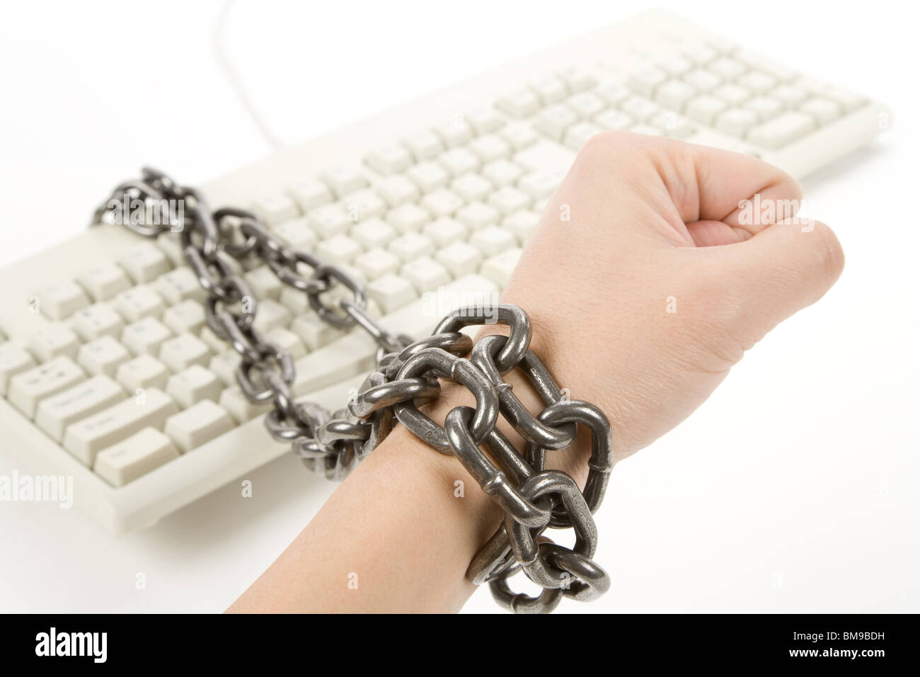 Mano era stata legata a catena con la tastiera del computer Foto Stock