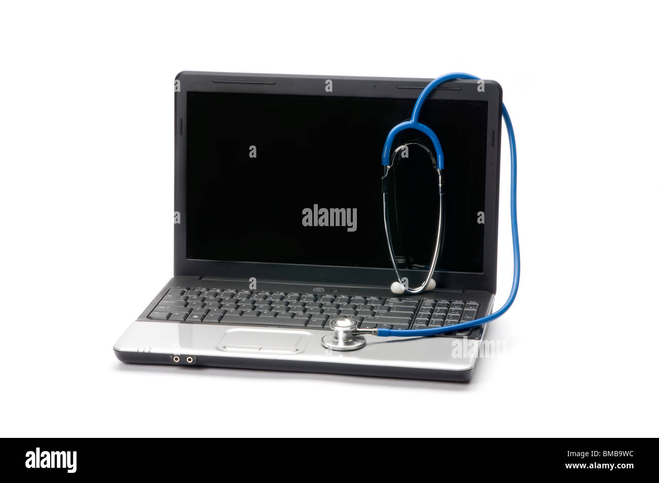 Computer portatile con uno stetoscopio Foto Stock