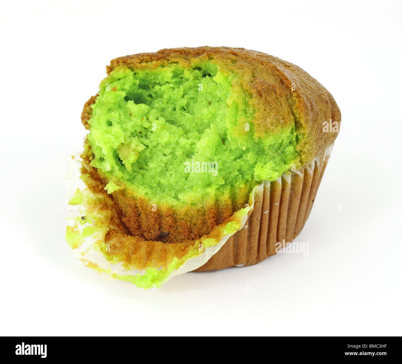 Pistacchio muffin che ha avuto un morso Foto Stock