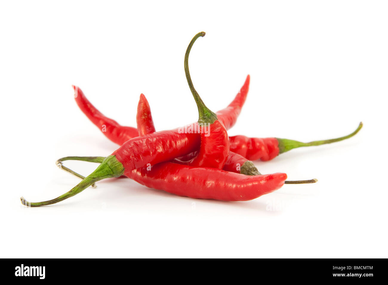 Peperoncino rosso su bianco Foto Stock