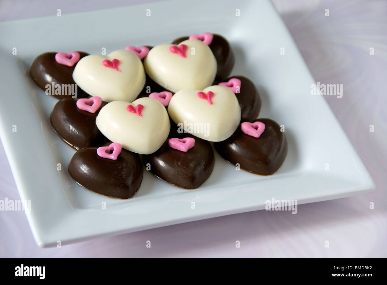 A forma di cuore ad cioccolatini Foto Stock