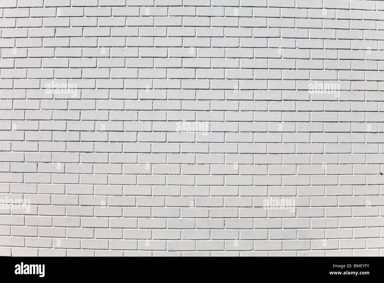 Bianco parete di mattoni per lo sfondo Foto Stock
