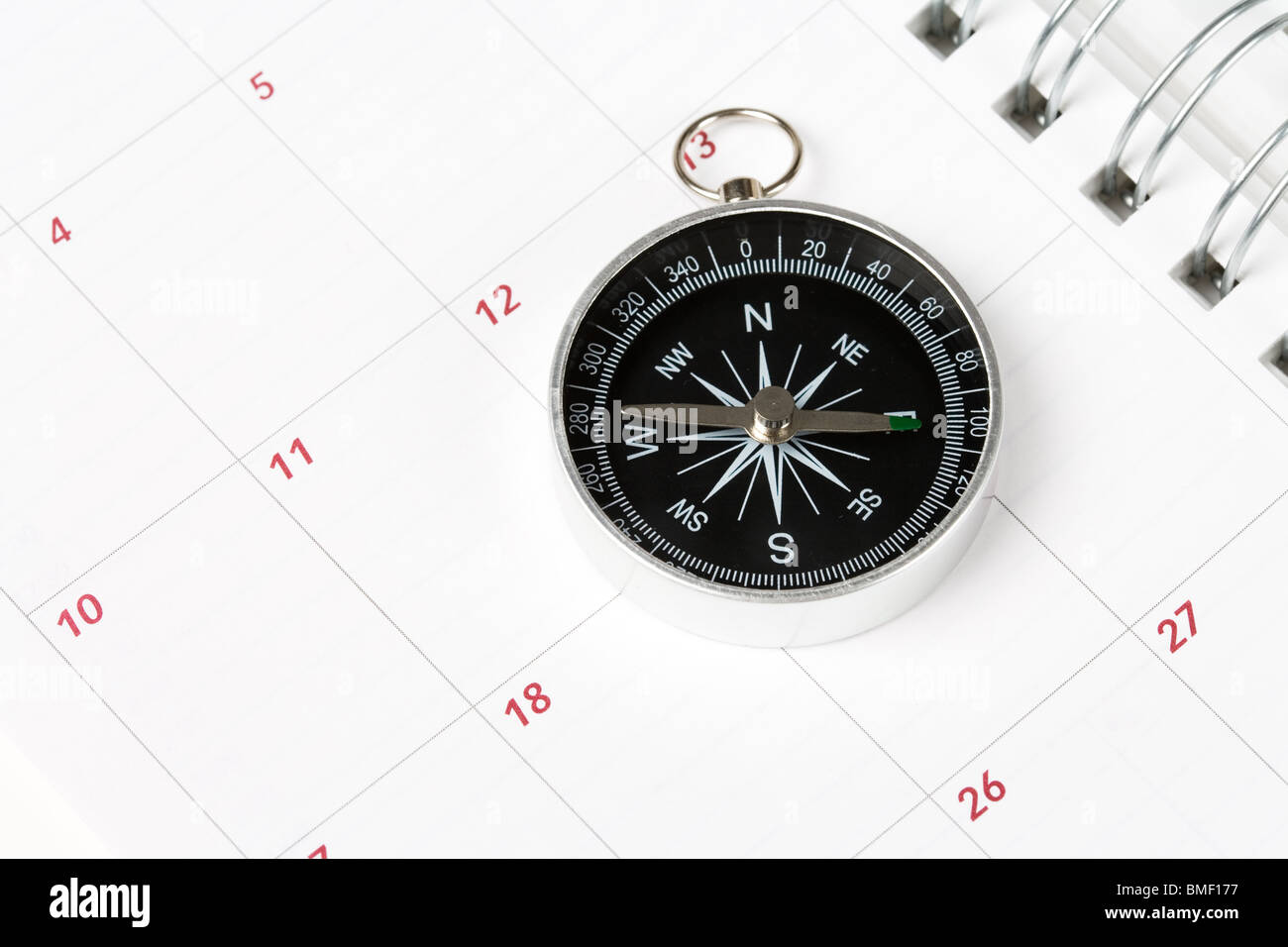 Il calendario e la bussola, concetto di pianificazione del tempo Foto Stock