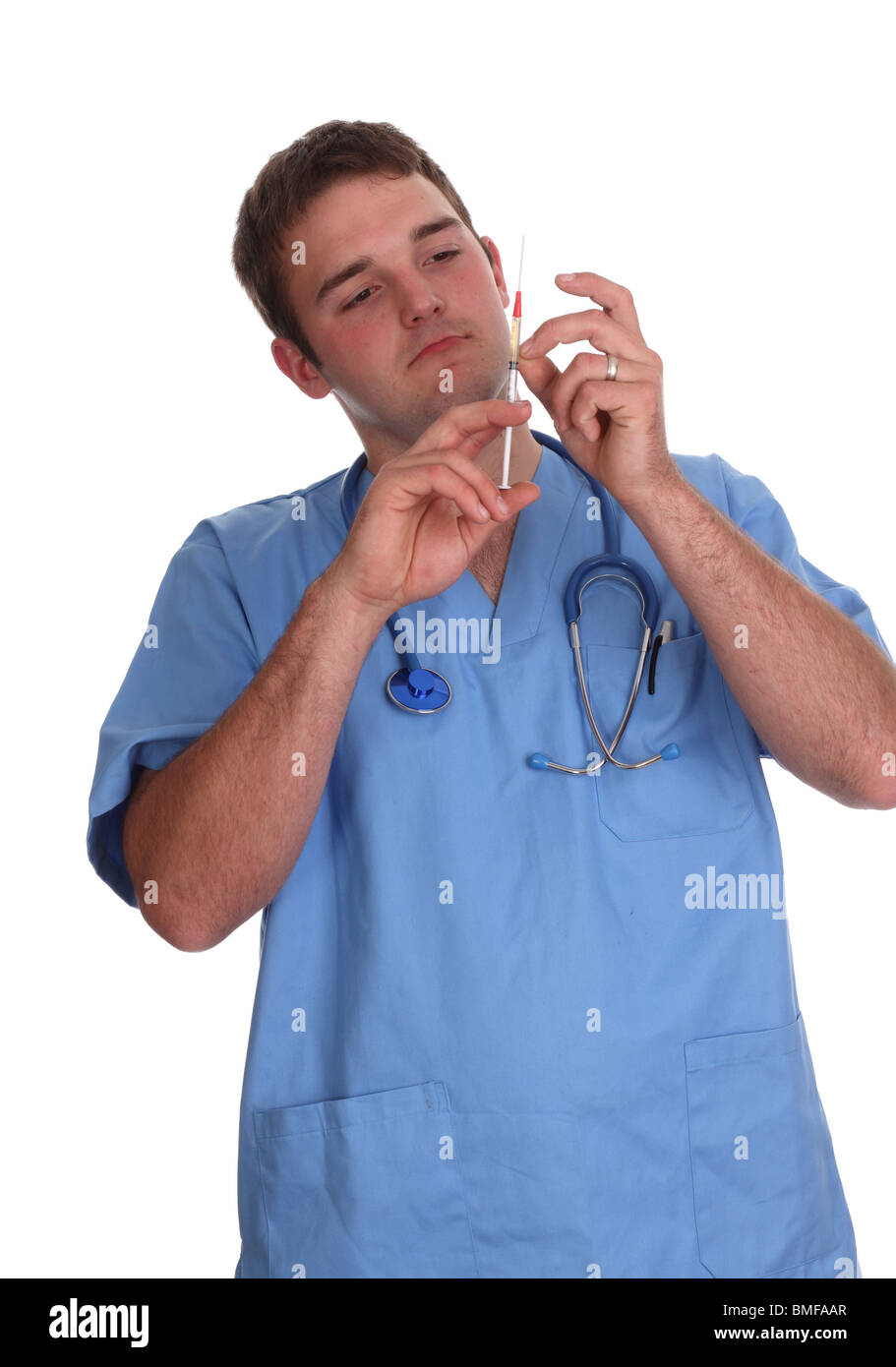 Maggio 2010 - giovane modello maschile in scrub medici come infermiera maschile, Foto Stock