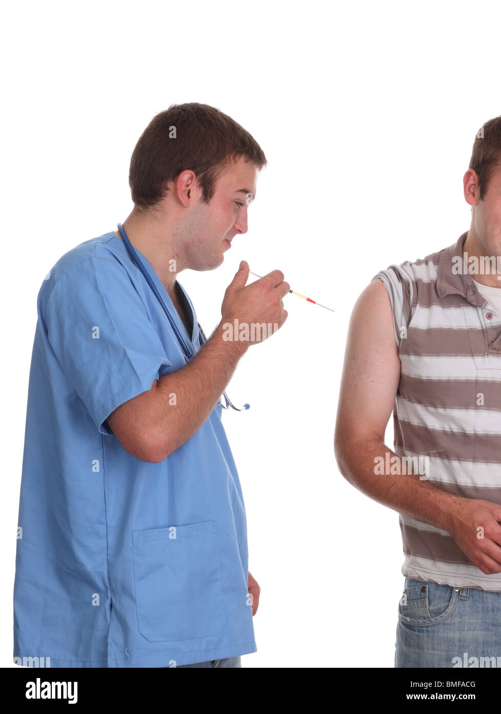 Maggio 2010 - giovane modello maschile in scrub medici come infermiera maschile, Foto Stock