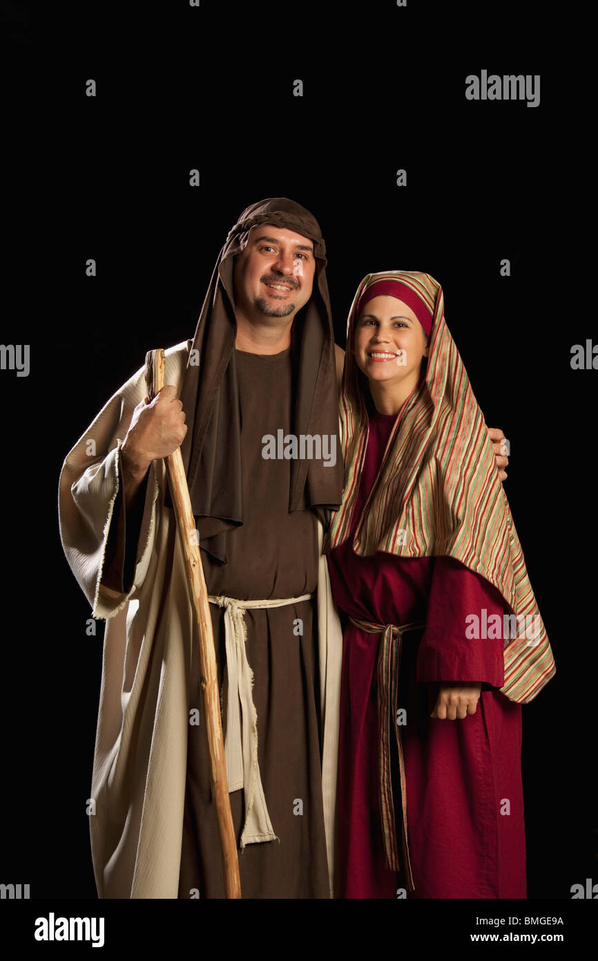 La gente vestita come Maria e Giuseppe Foto Stock