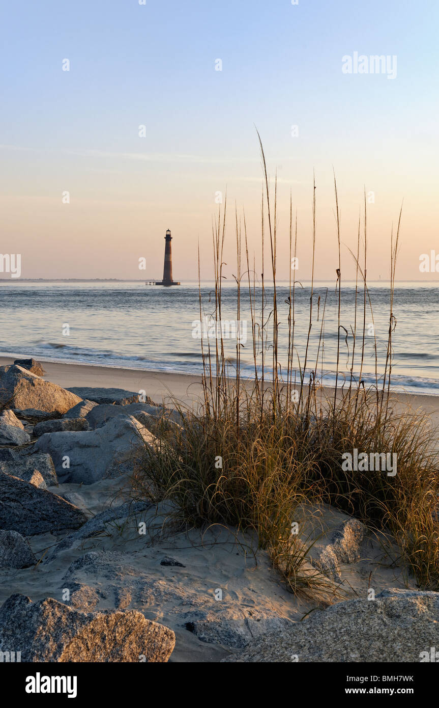 La prima luce del mattino a Morris faro di follia Beach nella contea di Charleston, Carolina del Sud Foto Stock