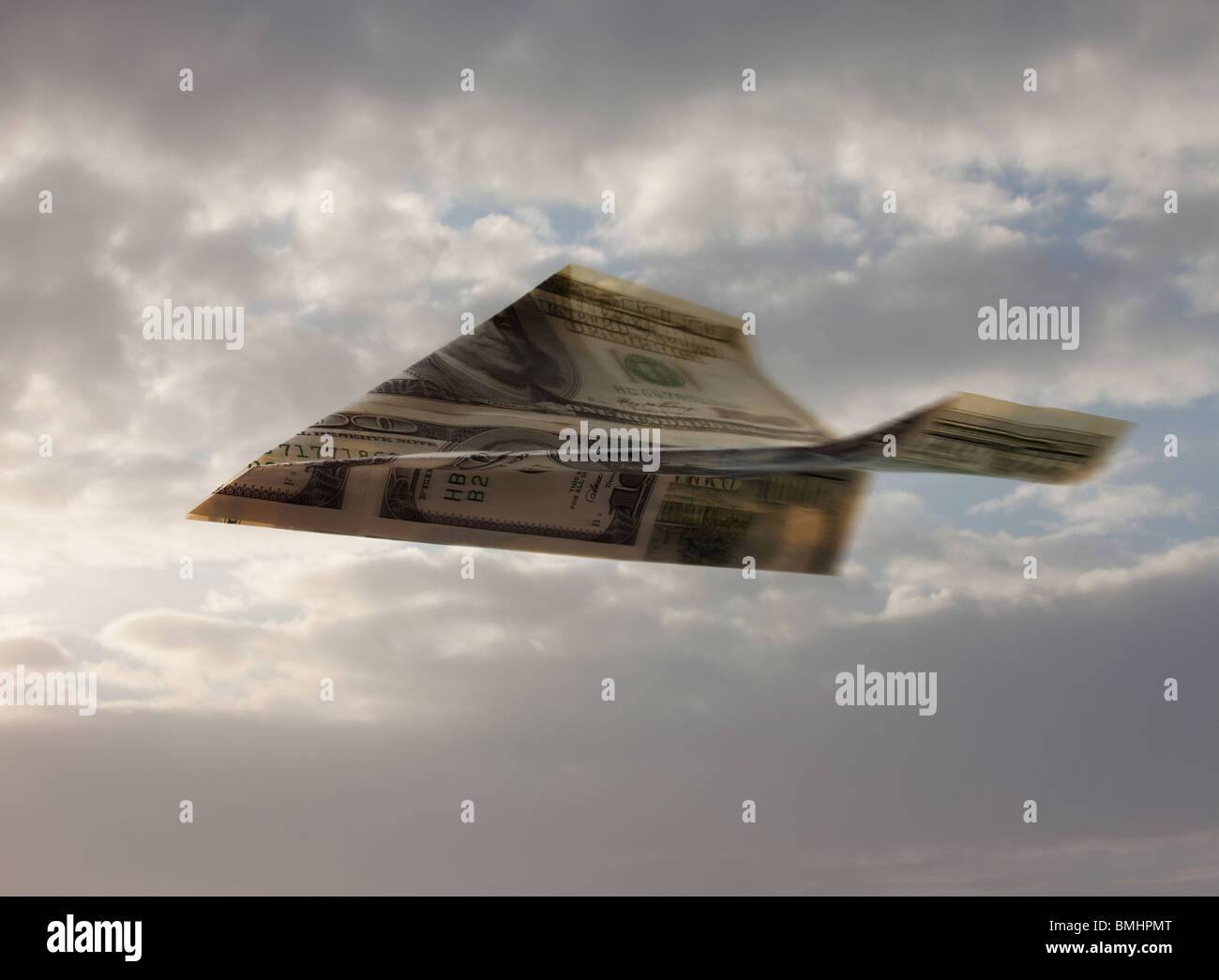 Aeroplano di carta fatta di denaro Foto Stock