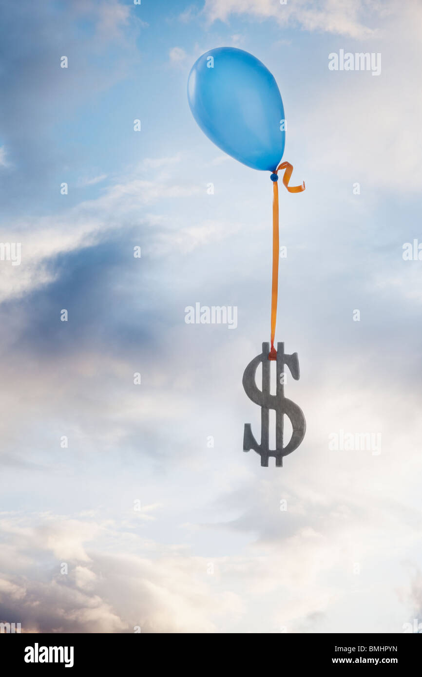 Il palloncino legato ad un simbolo del dollaro Foto Stock