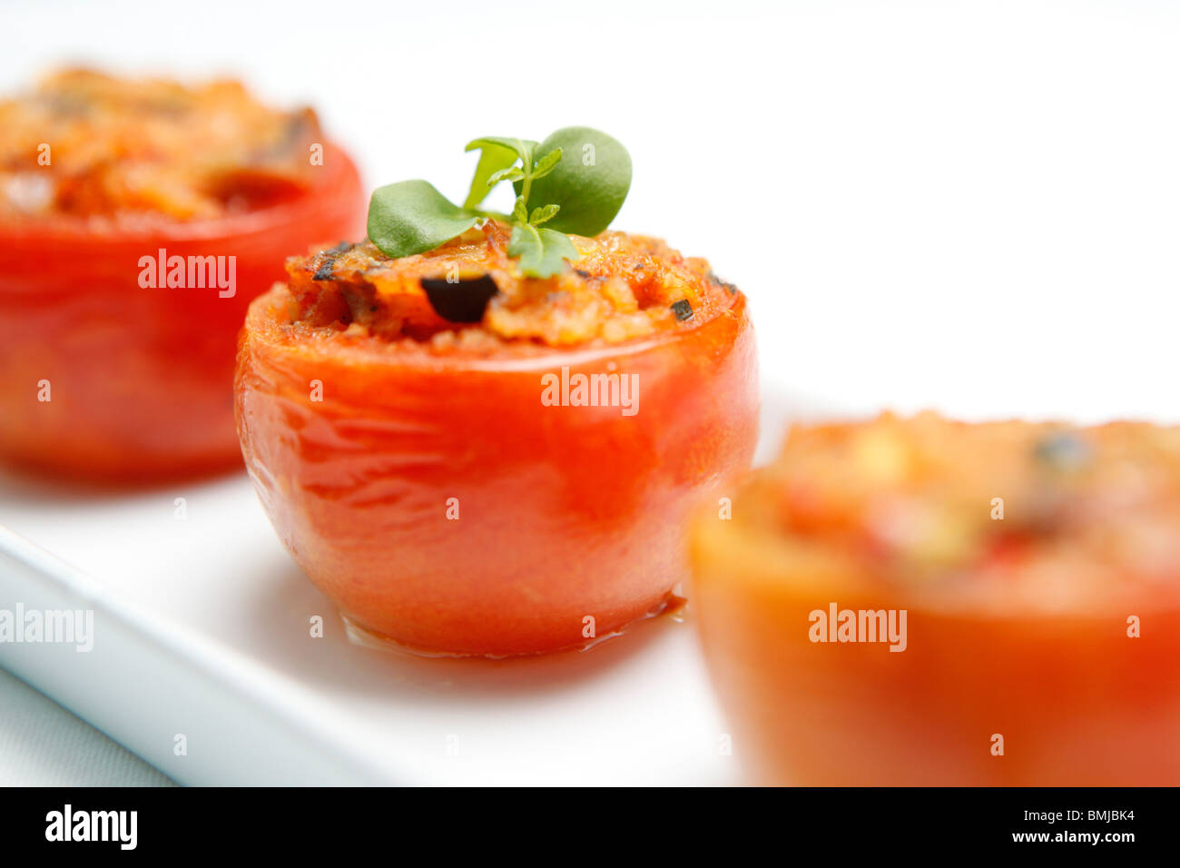 Il pomodoro mezze piatti serviti in un ristorante Foto Stock