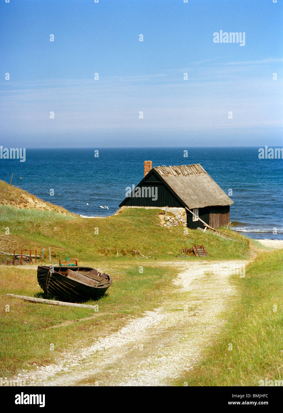 Una vecchia casa in riva al mare, Svezia. Foto Stock