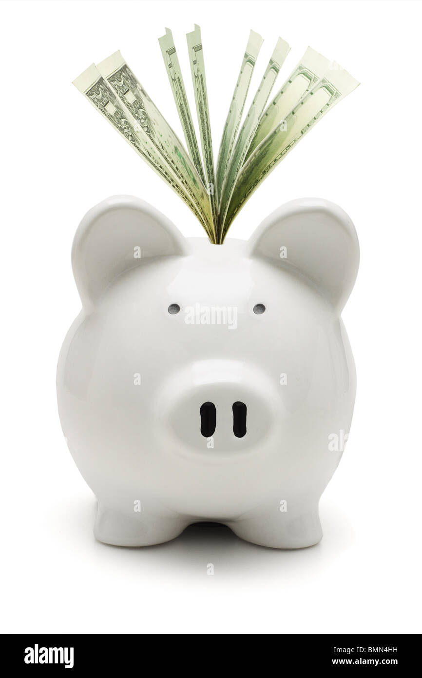 White salvadanaio e dollari USA su sfondo bianco Foto Stock