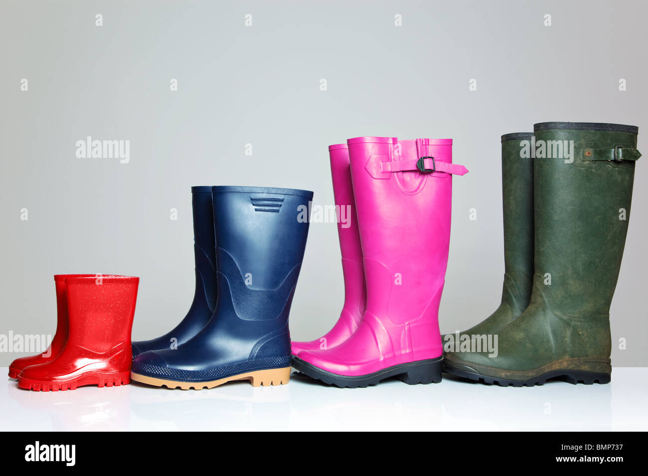 Un gruppo di wellie boots Foto Stock