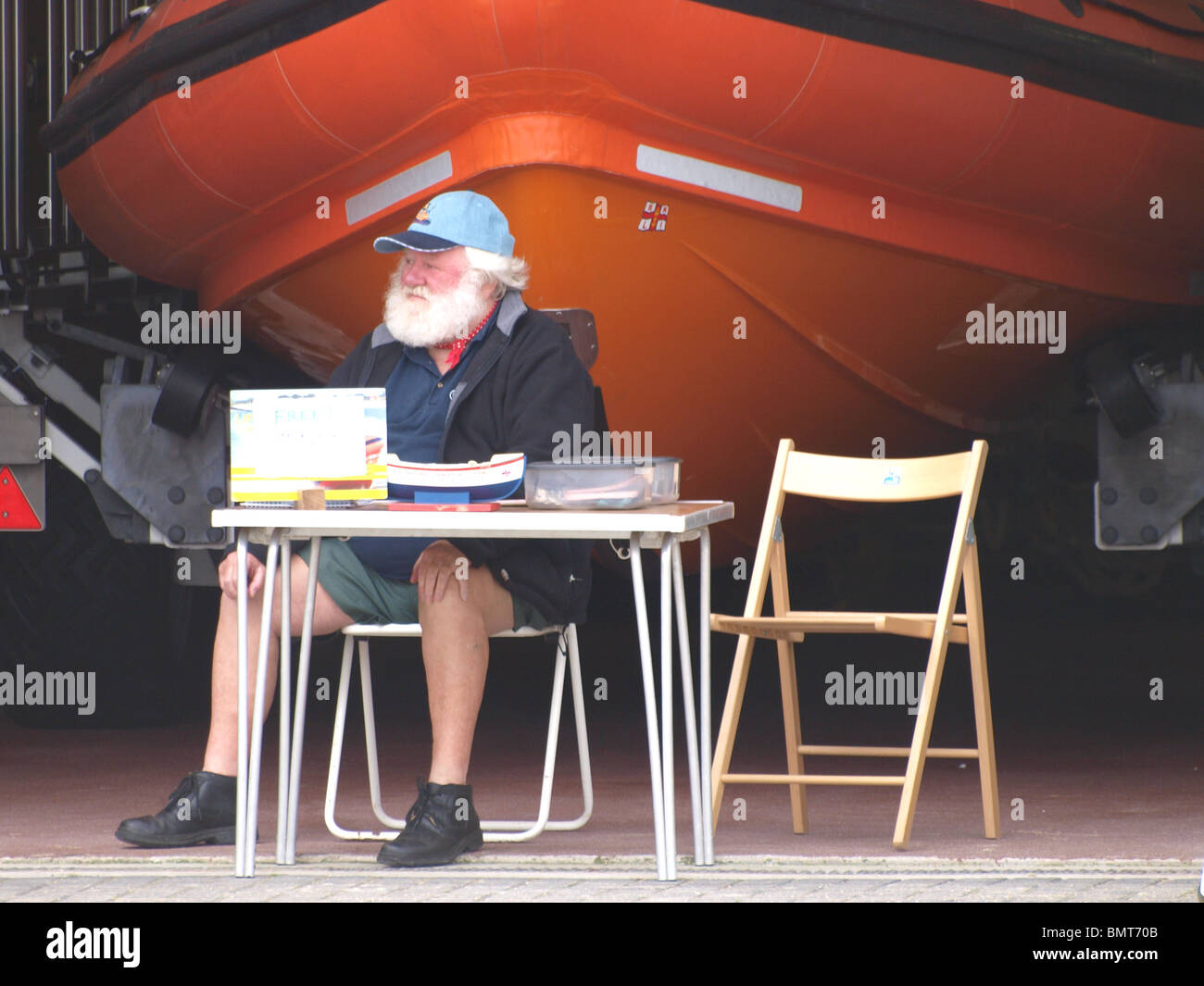 Il vecchio uomo la raccolta per le imbarcazioni, Newquay, Cornwall Foto Stock
