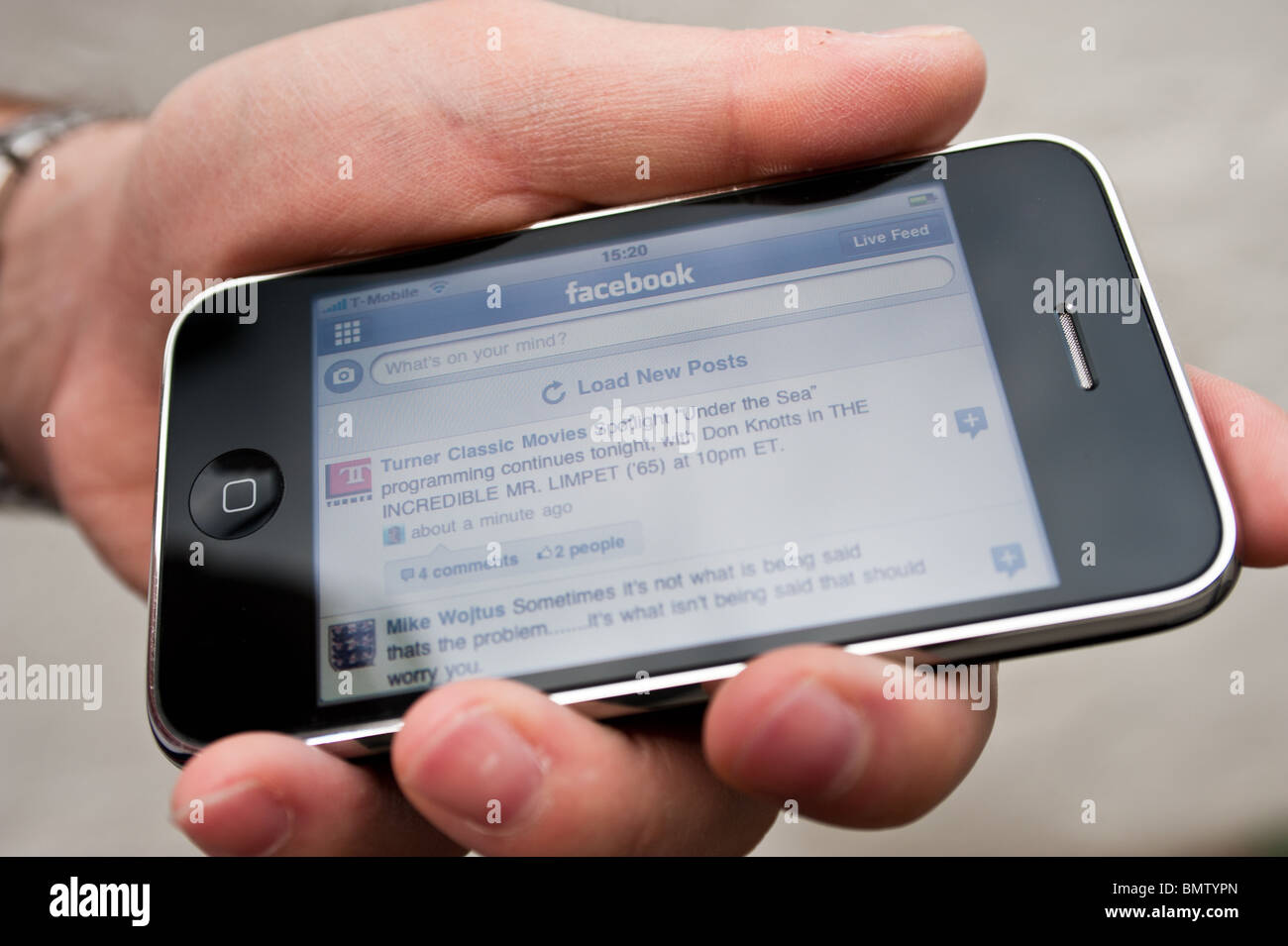 Accesso a Facebook su un iPhone Foto Stock