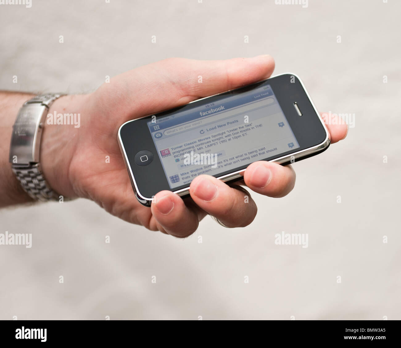 Accesso a Facebook su un iPhone Foto Stock