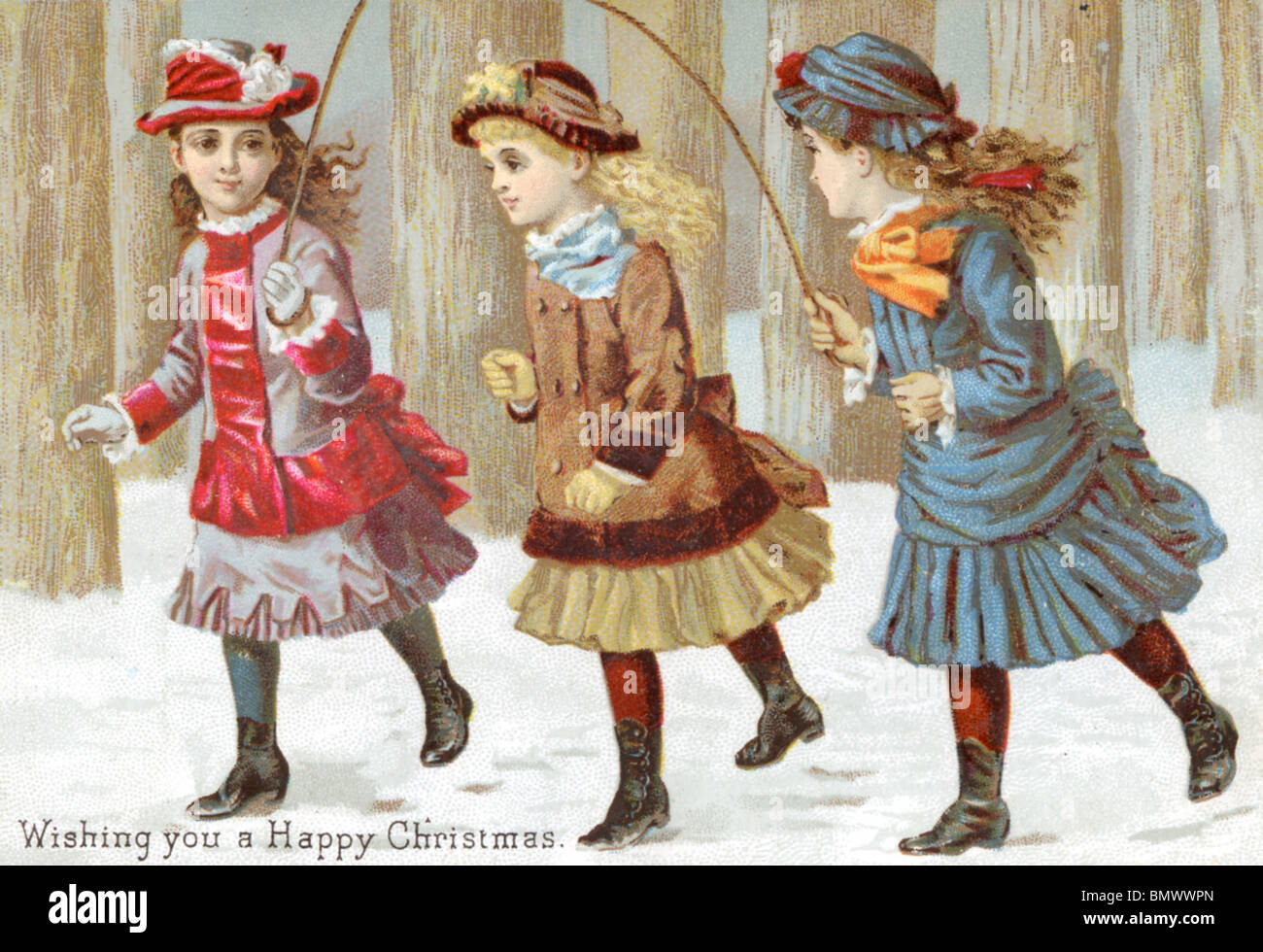 Scheda di Natale - ragazze giocando con una corda da salto nella neve Foto Stock
