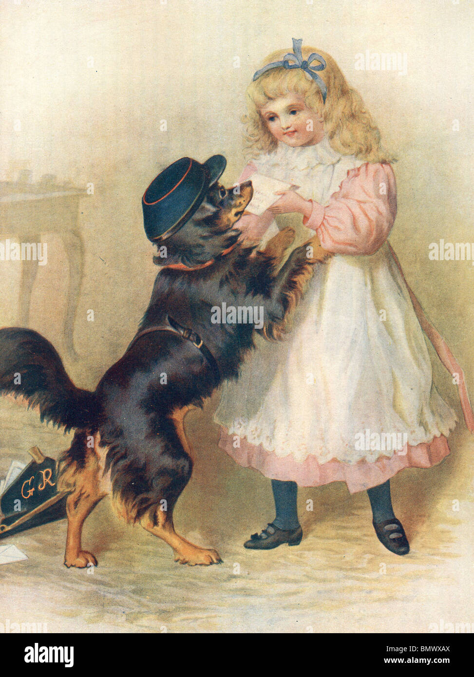 Giovane ragazza che gioca con il suo cane Foto Stock
