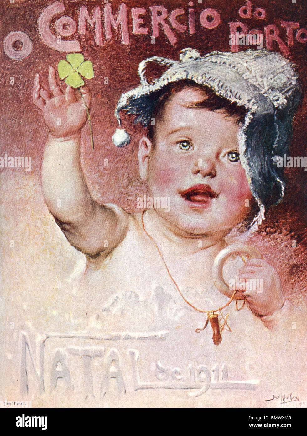 Baby tenendo un quattro Leaf Clover Foto Stock