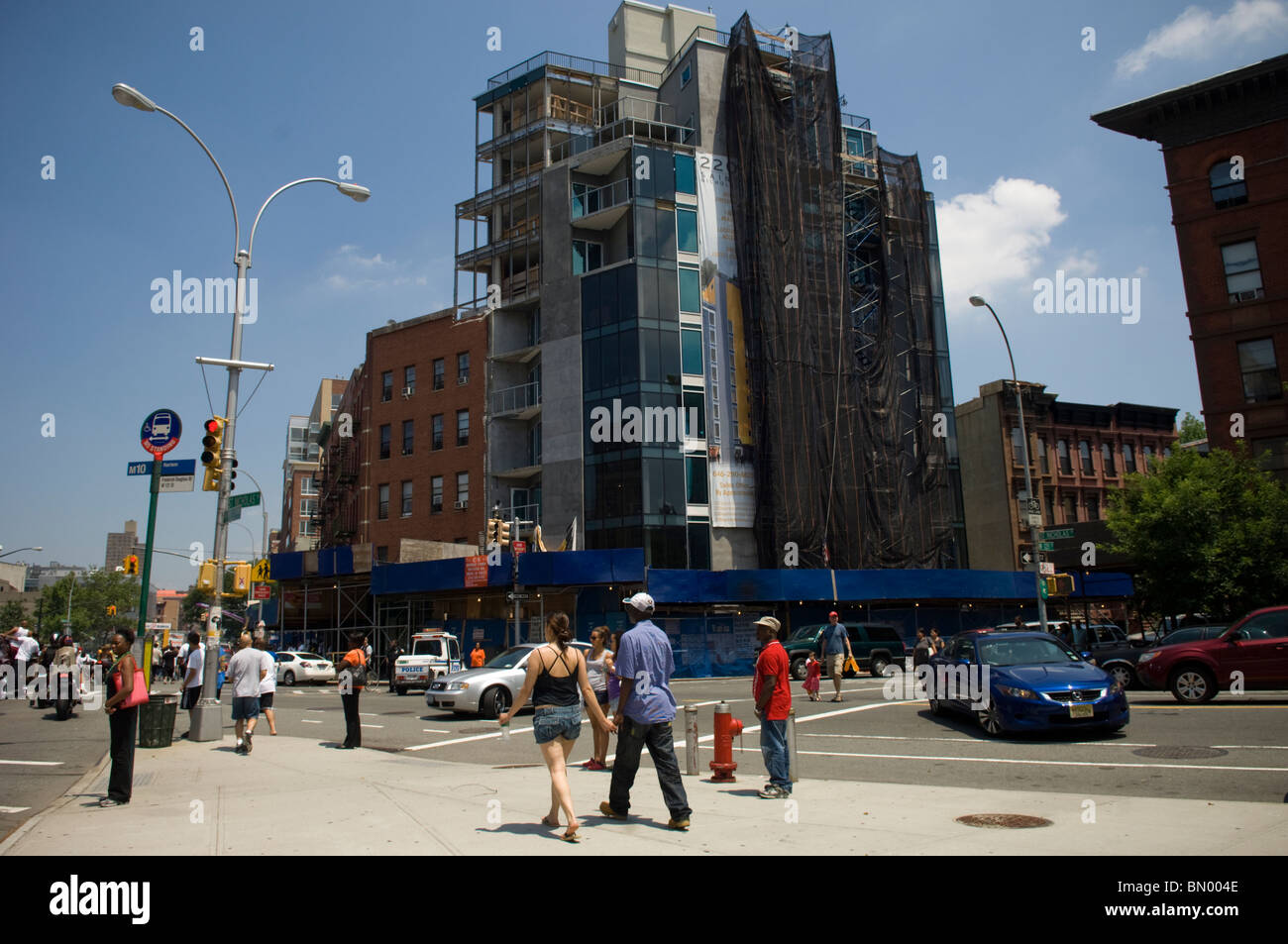 Condomini in costruzione nel quartiere di Harlem di New York Foto Stock