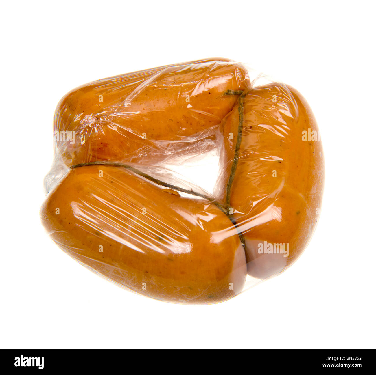 3 tre piccoli tini salsiccia avvolta in plastica foglio folie aggrapparsi mantenere fresche Regensburger wurst würstel würstel pellicola saran wrap Foto Stock