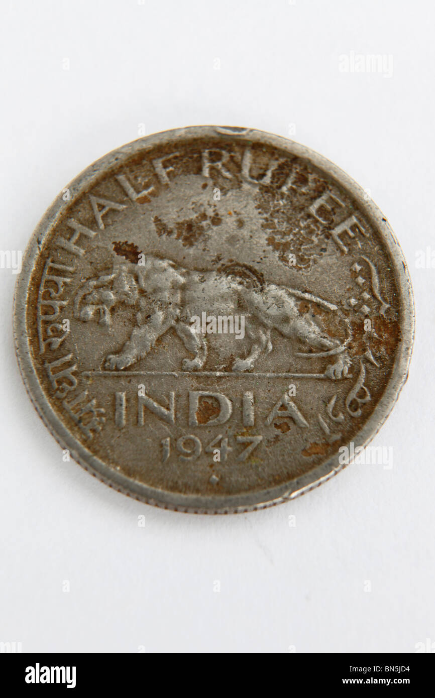 Una metà di rupie indiane coin risale al 1947, anno di indipendenza indiana. Foto Stock
