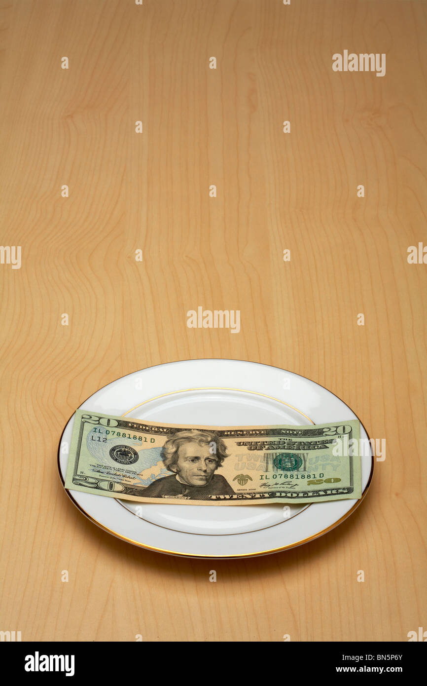 Cina Piastra con 20 dollari Dollaro recante su di esso Foto Stock