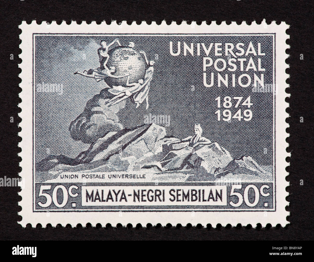 Francobollo da Malaya onorare l'Unione postale universale. Foto Stock