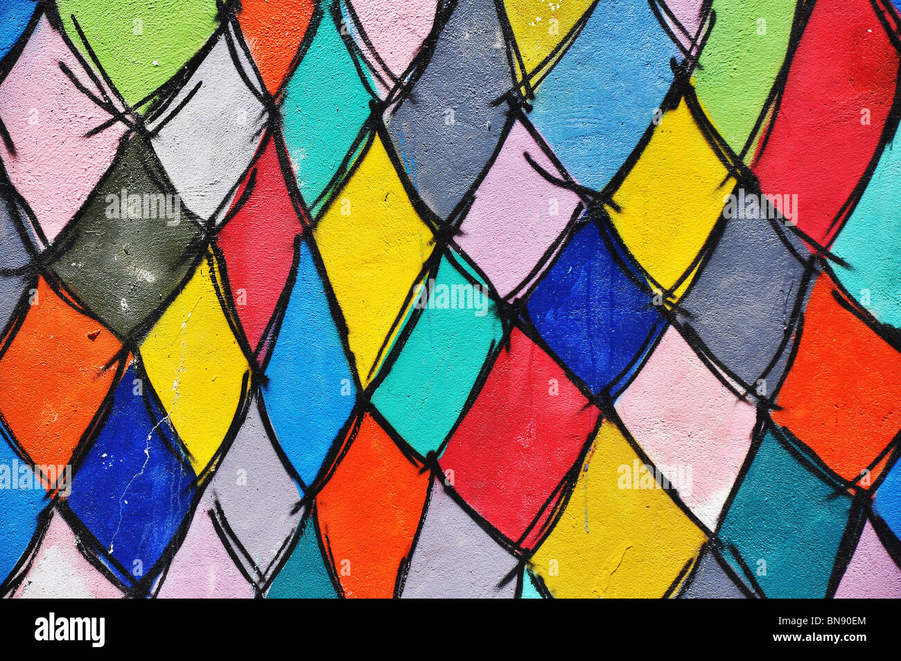 Coloratissimo graffito su una parete di strada-dettaglio. Foto Stock