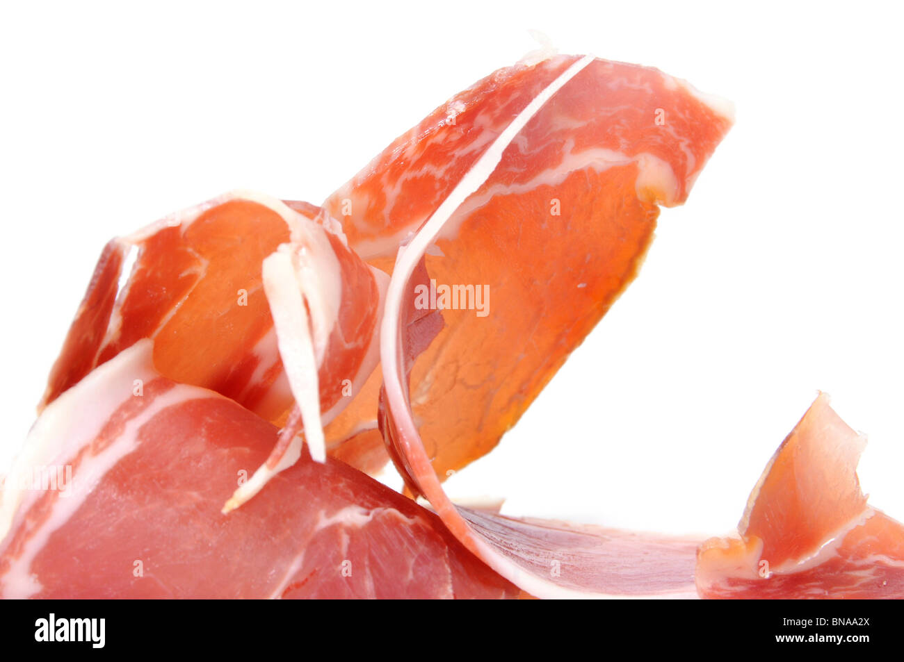 Primo piano di alcune fette di spagnolo il prosciutto Serrano Foto Stock