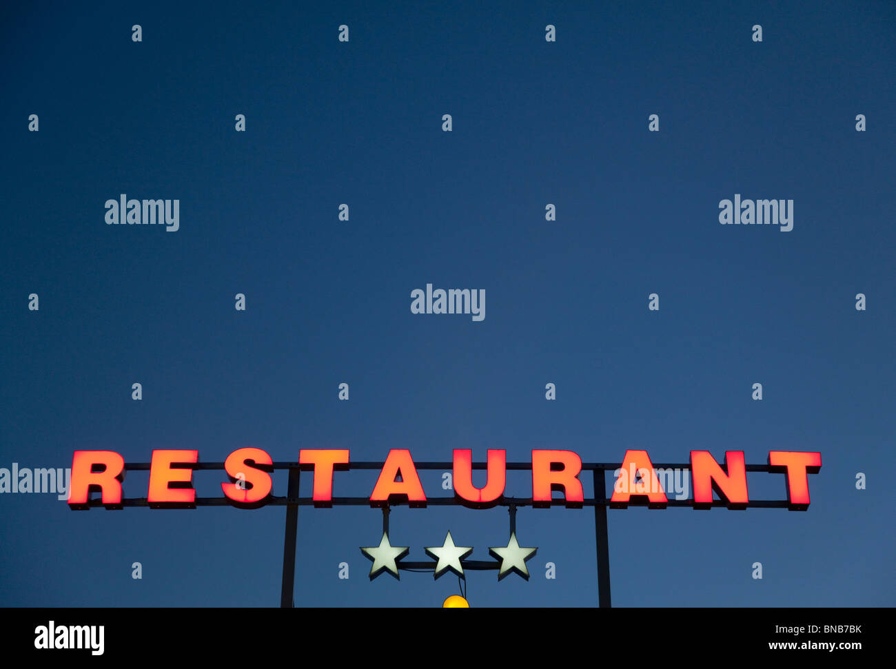 Neon 3 star restaurant sign Foto Stock
