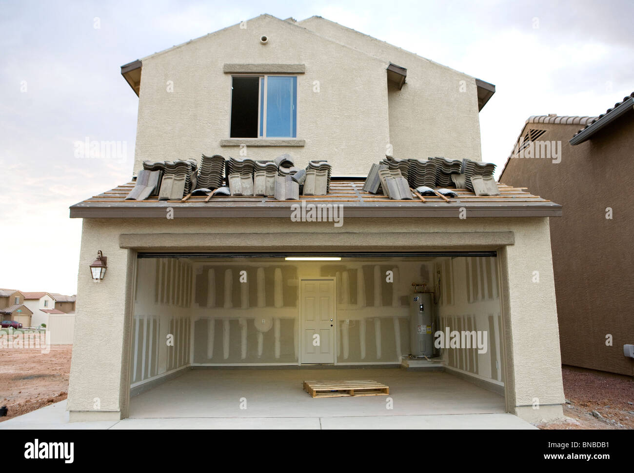 Incompiuta e abbandonata abitazioni sviluppi nell'area di Phoenix, in Arizona. Foto Stock