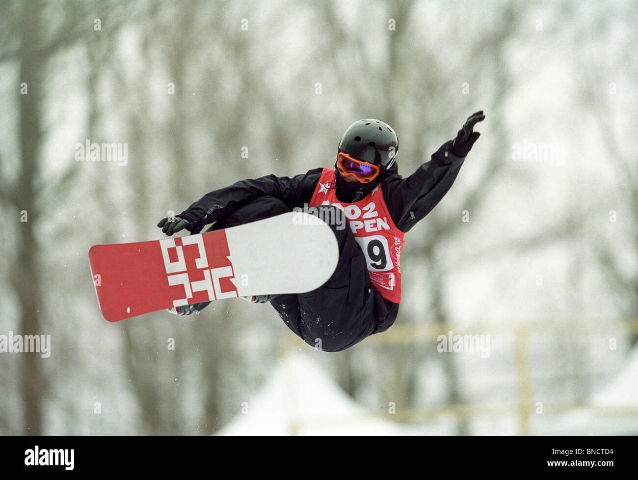 Kelly Clark (USA) a competere in snowboard halfpipe al 2002 US Open Snowboarding Championships. Foto Stock