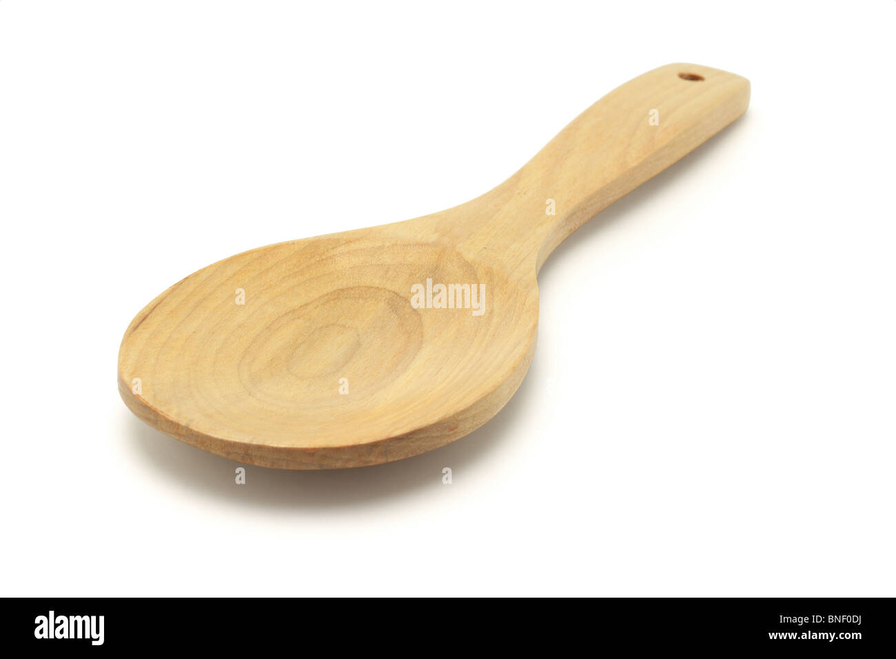 Grande cucchiaio di legno isolato su sfondo bianco Foto Stock