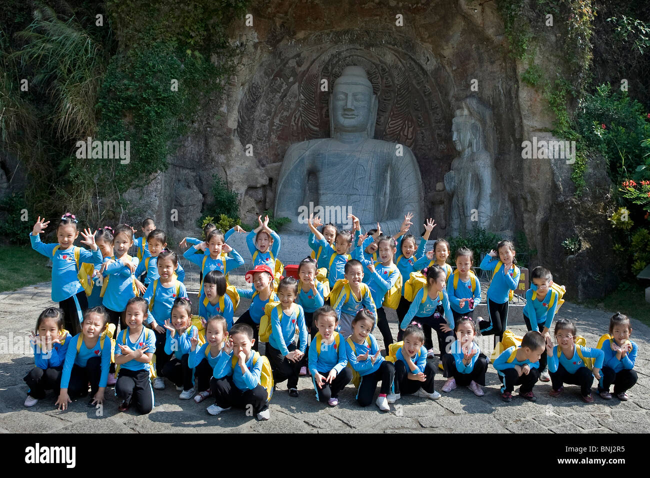 China Guandong Shenzhen City town city generoso bello Cina scultura parco bambini classe scolastica foto di gruppo Foto Stock
