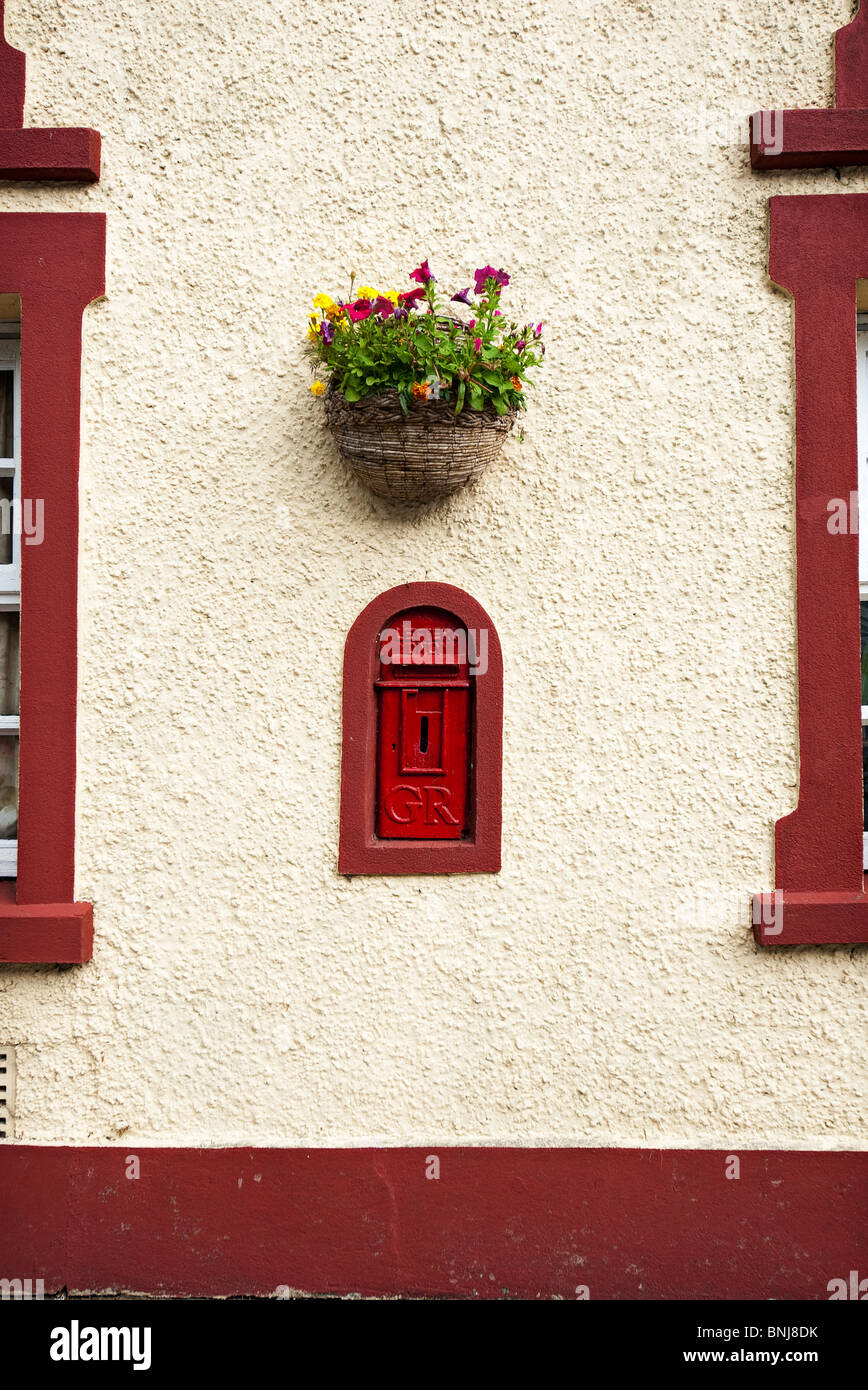 Vecchia casella postale nel muro di una casa in criben west wales Foto Stock