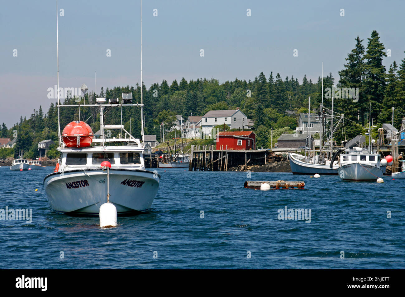 Costa del Maine Port Clyde New England USA villaggio di pescatori Oceano Atlantico Fishermans per la porta del dock lobster barche Foto Stock