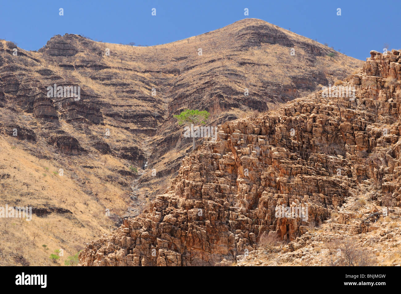 Le colline rocciose Palmwag Kaokoland Kunene Regione Africa Namibia Travel natura rocce Foto Stock