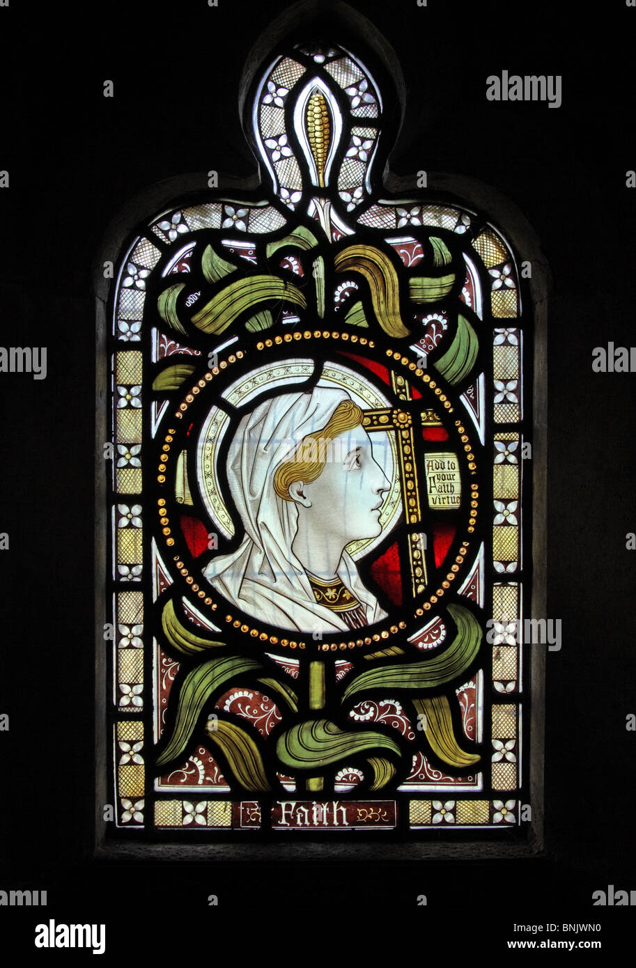 Una delle vetrate colorate raffiguranti la fede, la chiesa di San Lorenzo, Lighthorne Warwickshire, Inghilterra Foto Stock