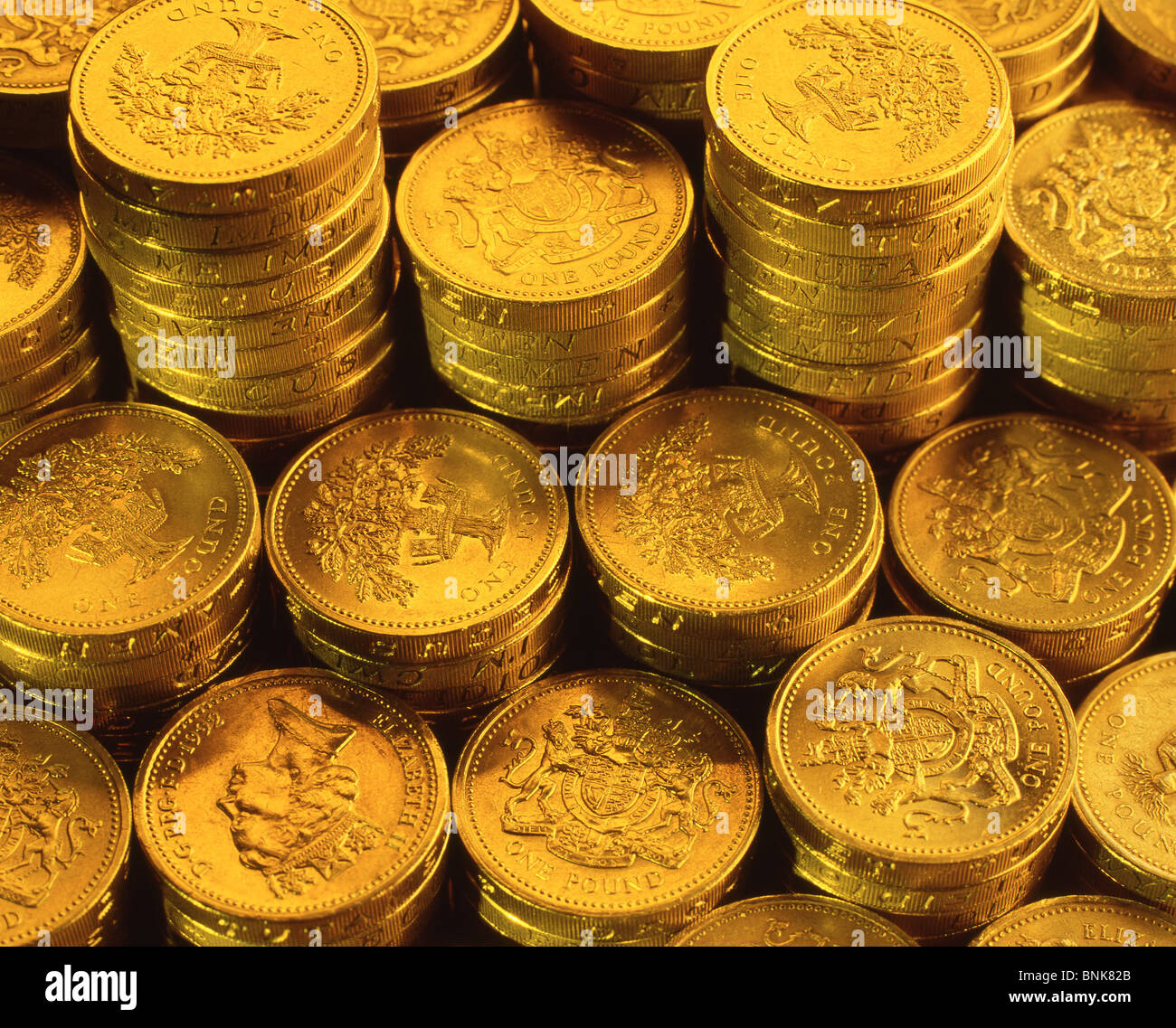 Pila di British pound monete, London, England, Regno Unito Foto Stock