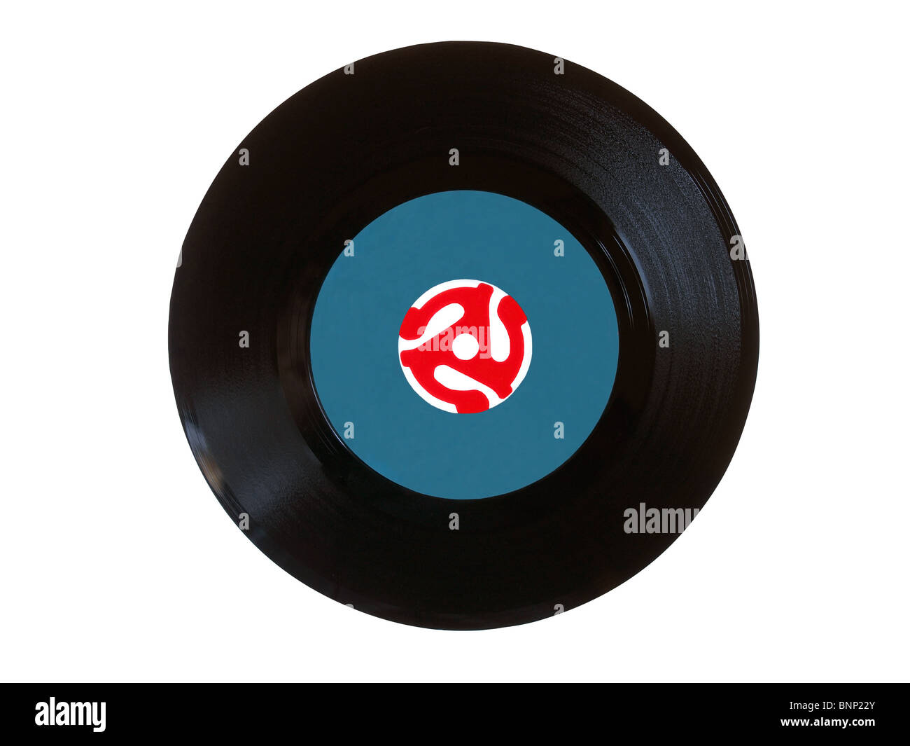 Vintage 45 giri record di vinile con colore rosso brillante adattatore. Il disco è stato messo sul tavolo luminoso per rendere l'adattatore traslucido. Foto Stock