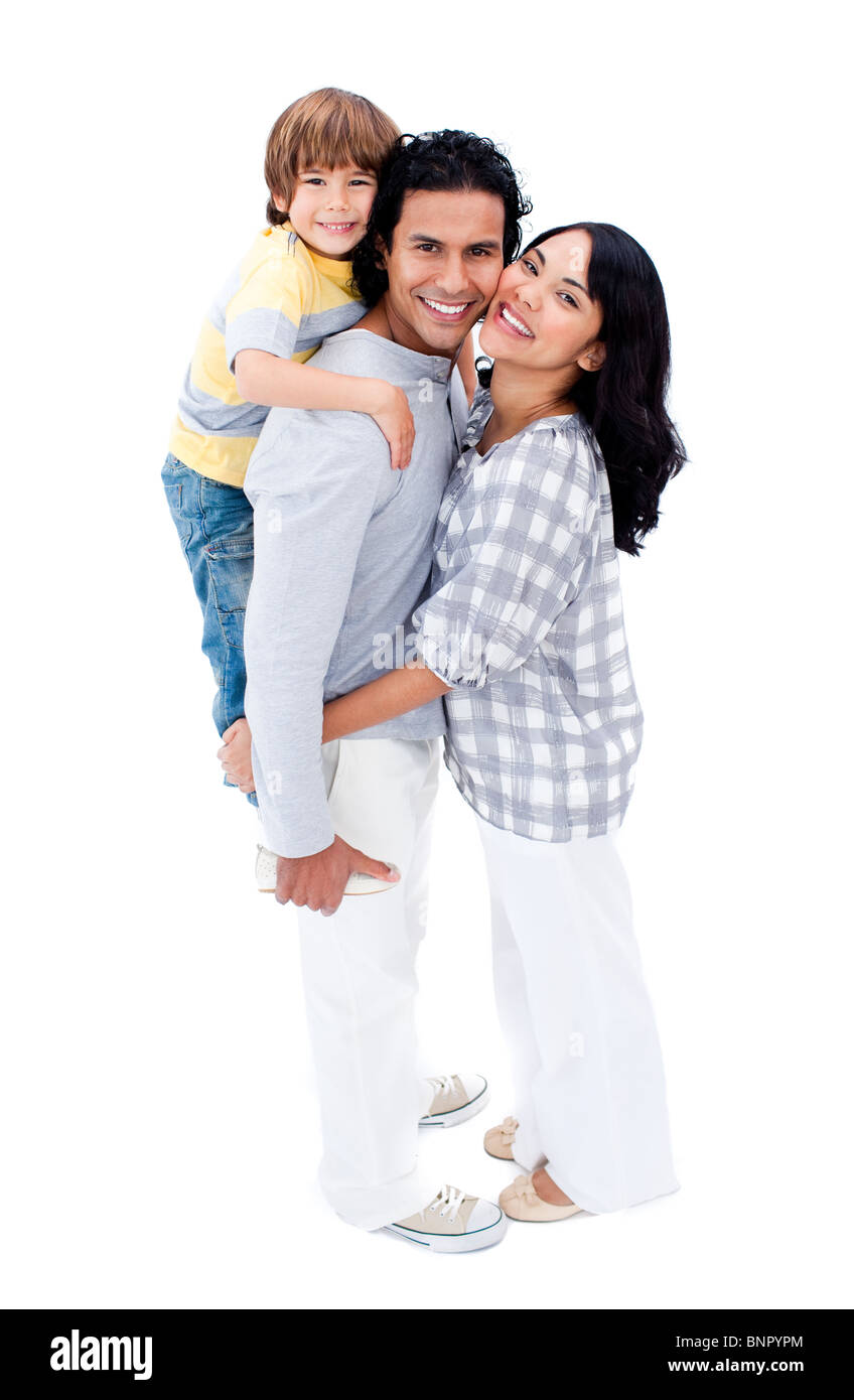 La famiglia felice contro uno sfondo bianco Foto Stock