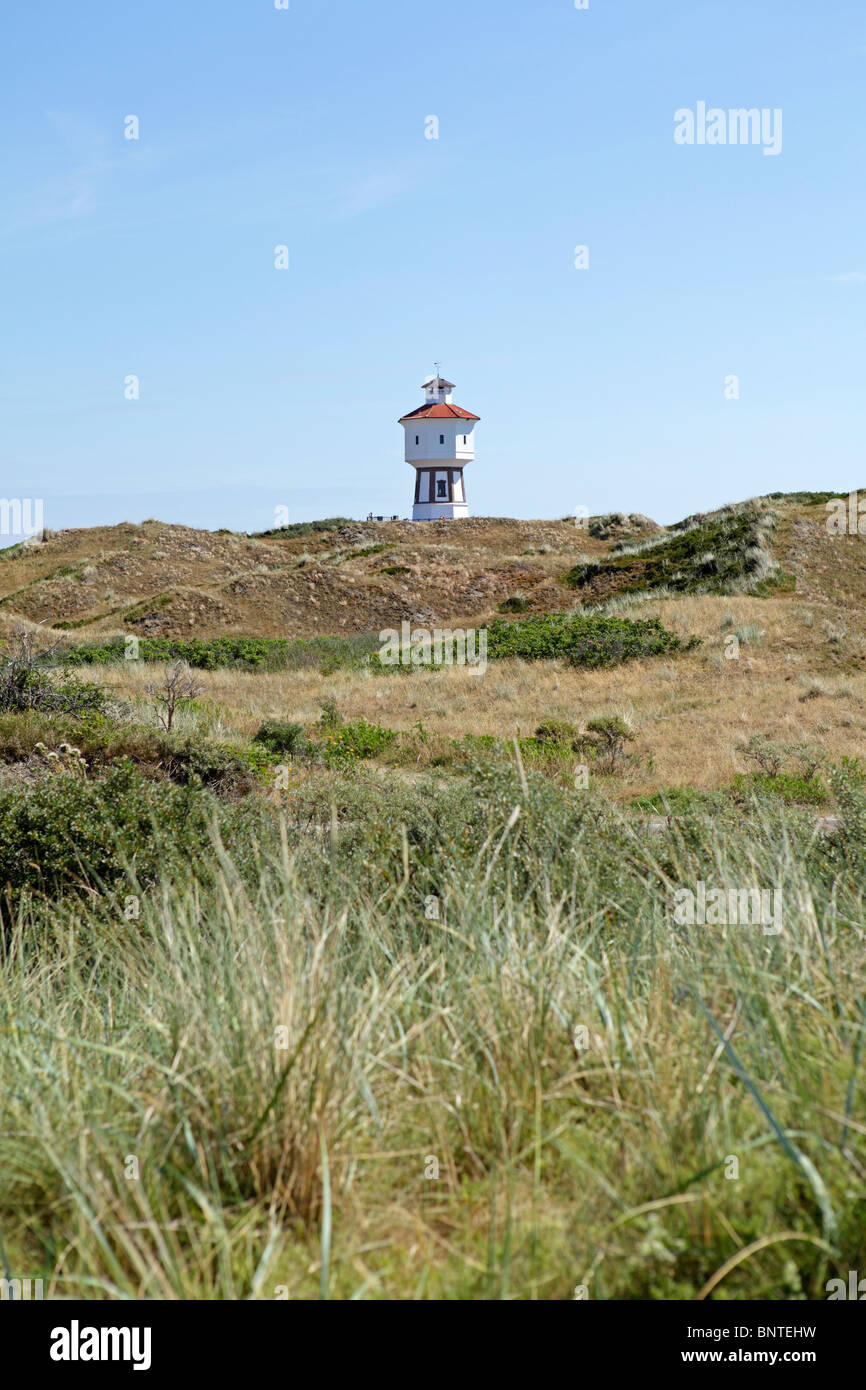 Il white water tower, un punto di riferimento di Langeoog isola, East Friesland, Bassa Sassonia, Germania Foto Stock