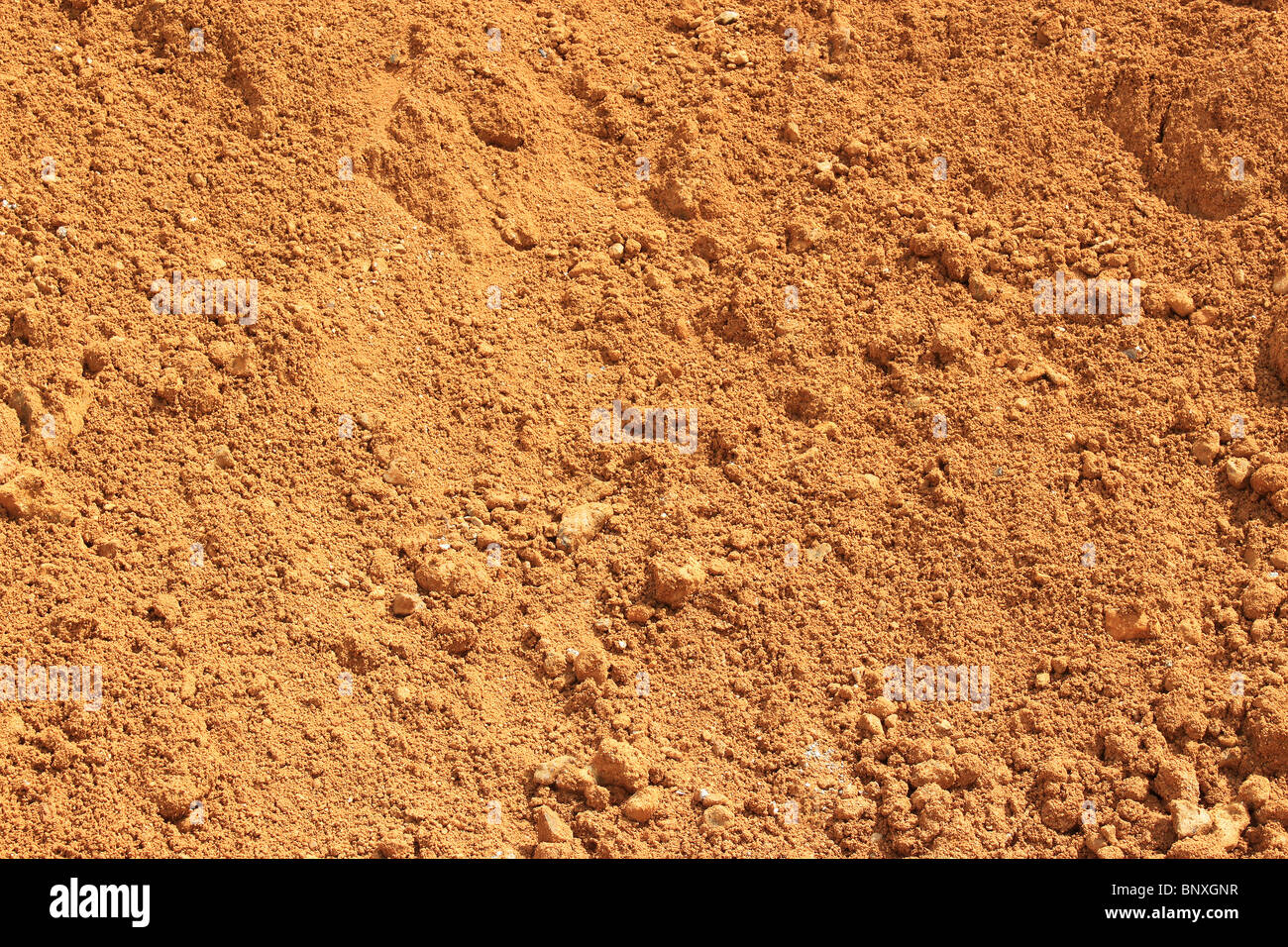 Terra rossa proveniente da una buca di sabbia Foto Stock