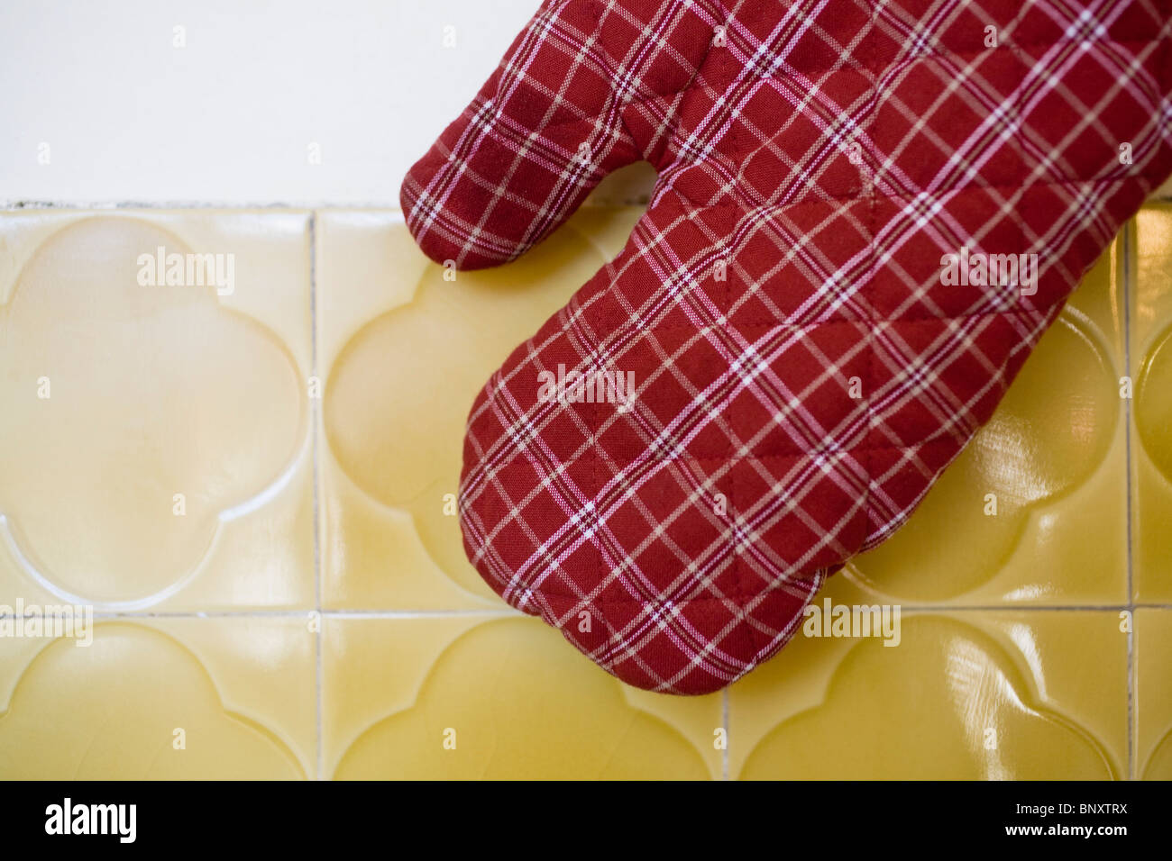 Guanto da forno Foto Stock