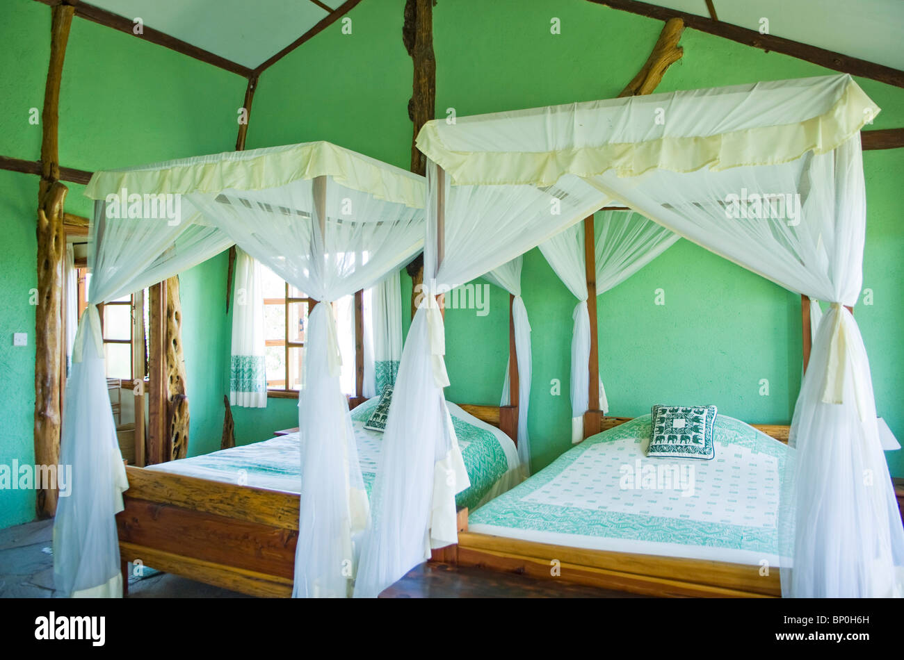 Kenia Masai Mara. Una camera da letto in topi House, una piccola e private safari lodge nella zona di Olare Orok Conservancy. Foto Stock