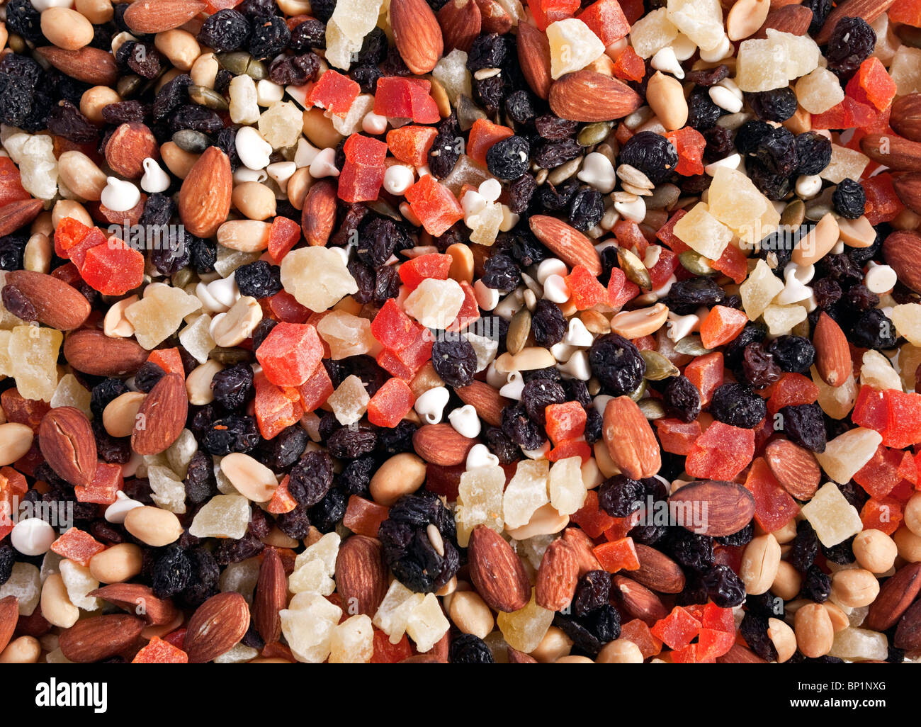Tropicali colorati trail mix. Un snack sani. Foto Stock