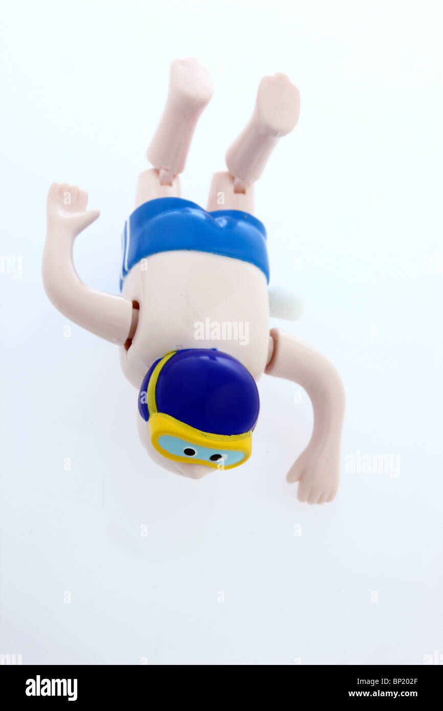 Mechanische Spielzeugfigur, aufziehbar, bewegt Arme und Beine, kann schwimmen. Foto Stock