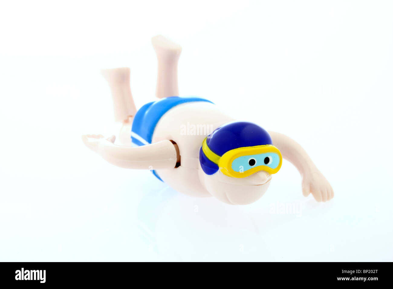 Mechanische Spielzeugfigur, aufziehbar, bewegt Arme und Beine, kann schwimmen. Foto Stock